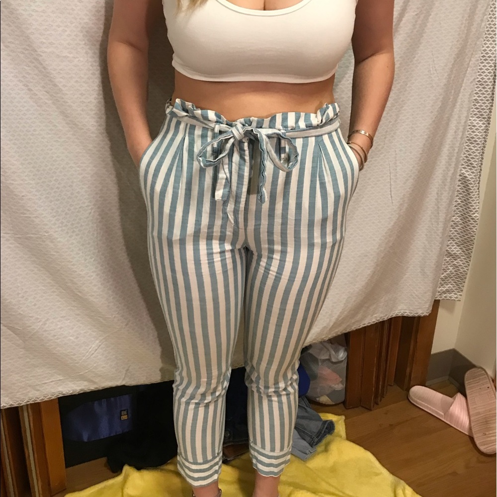 White and blue striped pants